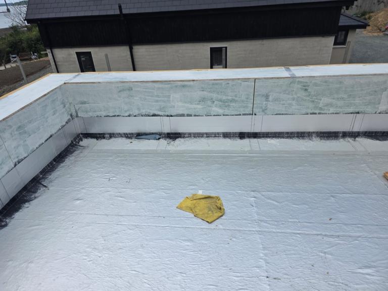 The entire area is then coated