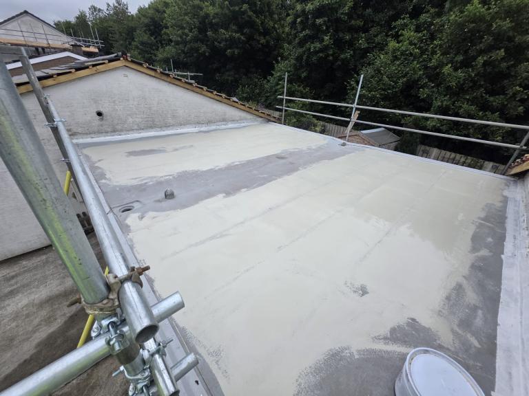 The roof was then re-screeded with a less viscous mix of leveling resin mortar.