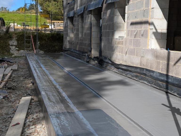 The basement roof and walkway will be watertight and element-proof for decades to come
