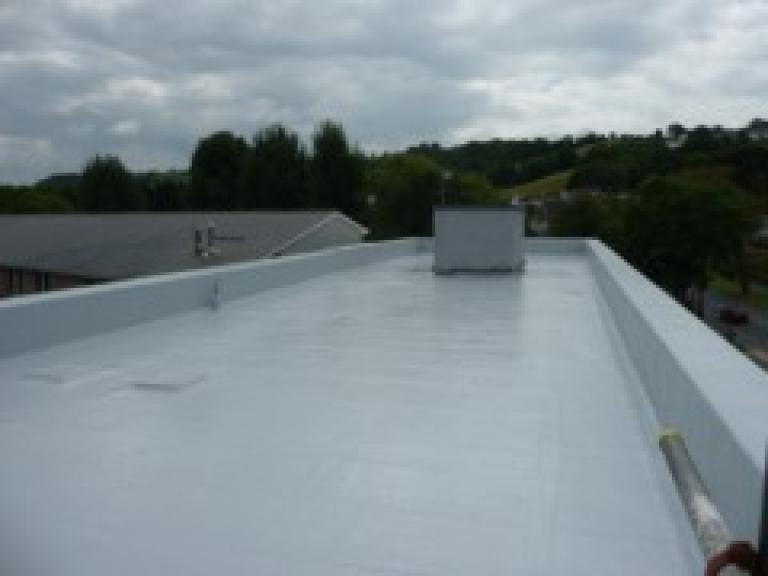 ... A guaranteed 15 year roofing system for this public sector building!