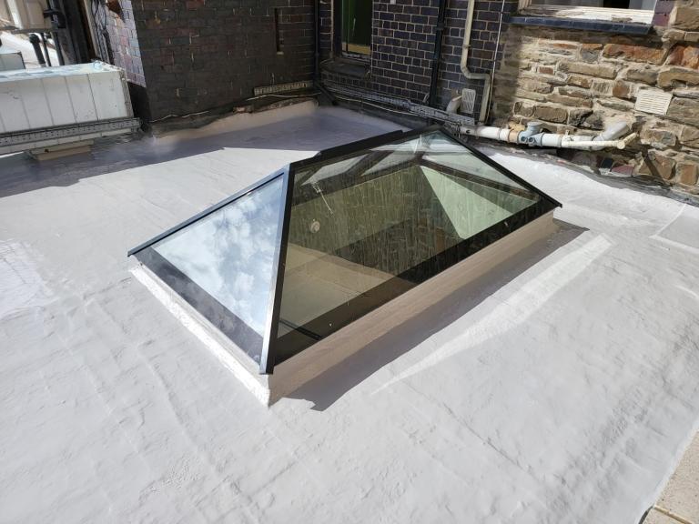Not a splash on this raised skylight roof - our process is neat and mess-free