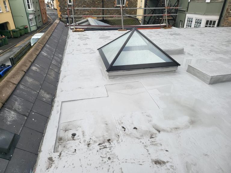 This picture shows some of the water drainage problems prior to application