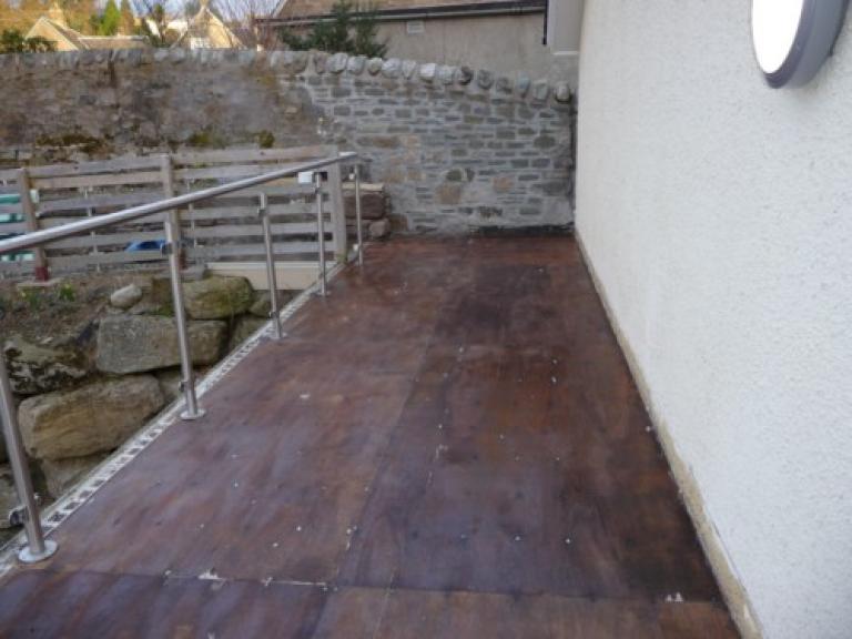 First, we removed the existing tiles