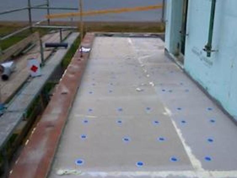 The fitted insulation on one of the south facing terrace roofs