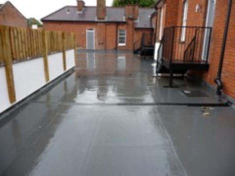 Failure of fibreglass to cope with expansion and contraction causes roof 'tenting'