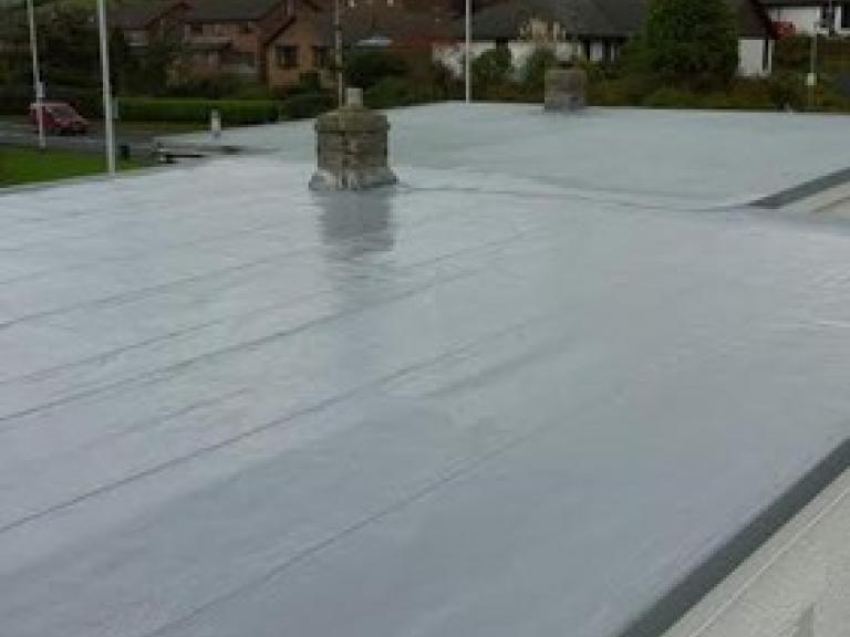 The seamless roof joined easily to the neighbour's GRP system