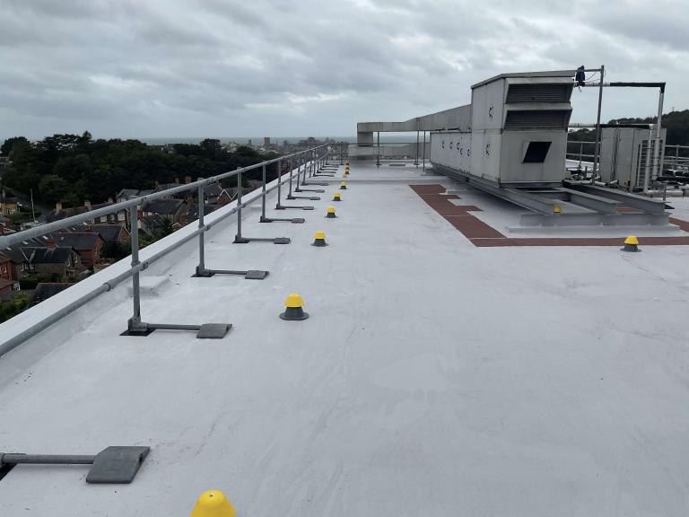 These air conditioning units needed lifting 150mm above the upstand