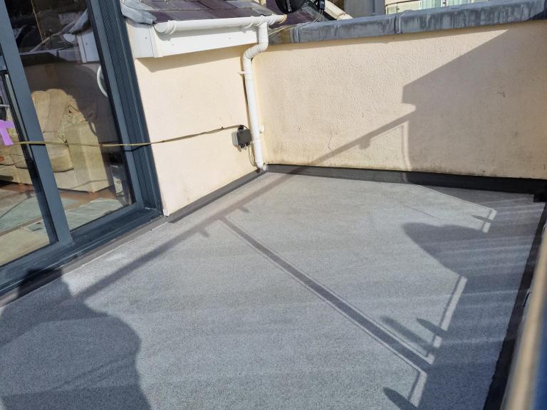 The final balcony terrace is smart, high spec and will now drain properly!