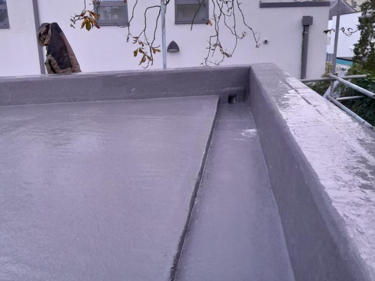 Inbuilt guttering carries surface water quickly away