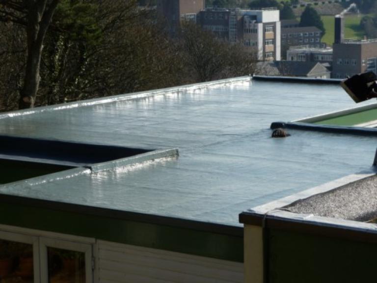 ... and the 15 year roof system was completed!