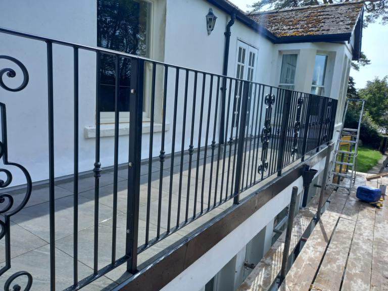 with traditional, original-looking railings
