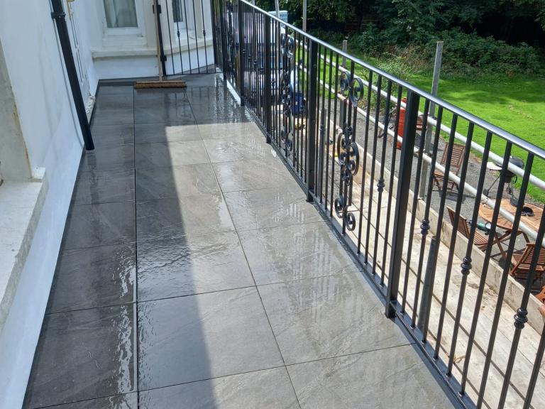Porcelain tiling was then laid and railings fitted