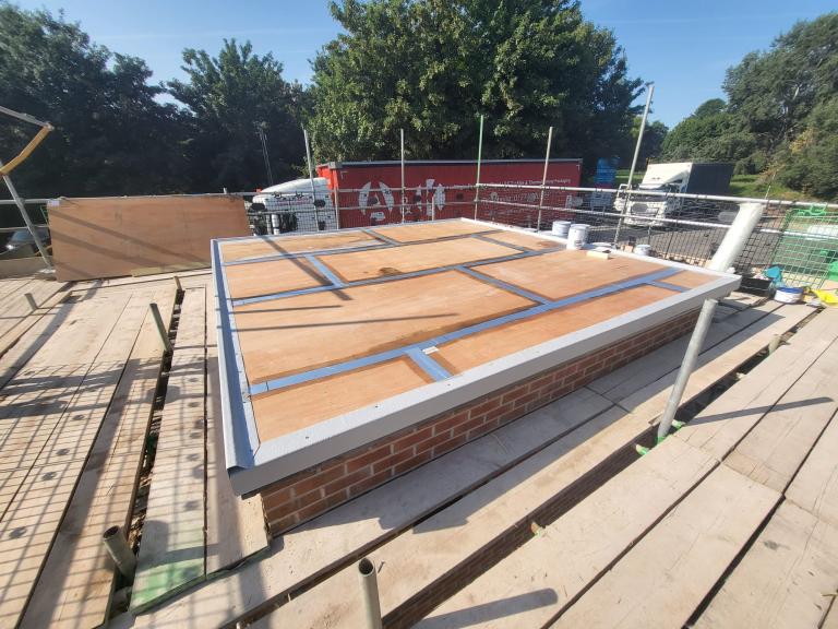 Wood and metal substrate showing ridging clearly