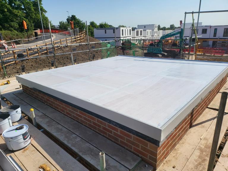 The roof after the first coat - already fully sealed