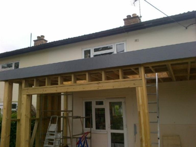 Deep fascia edging surrounding the two velux skylight roof windows