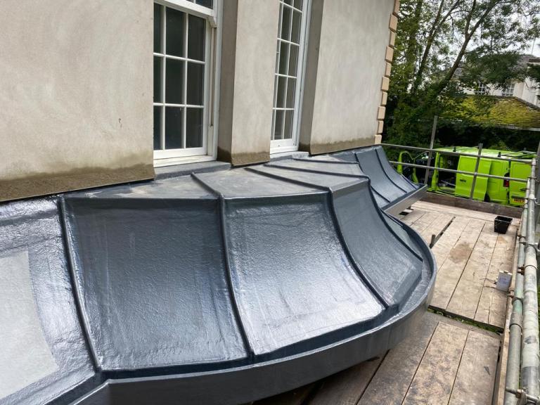 The motif extends along the whole wall, creating a seamless, jointless finish