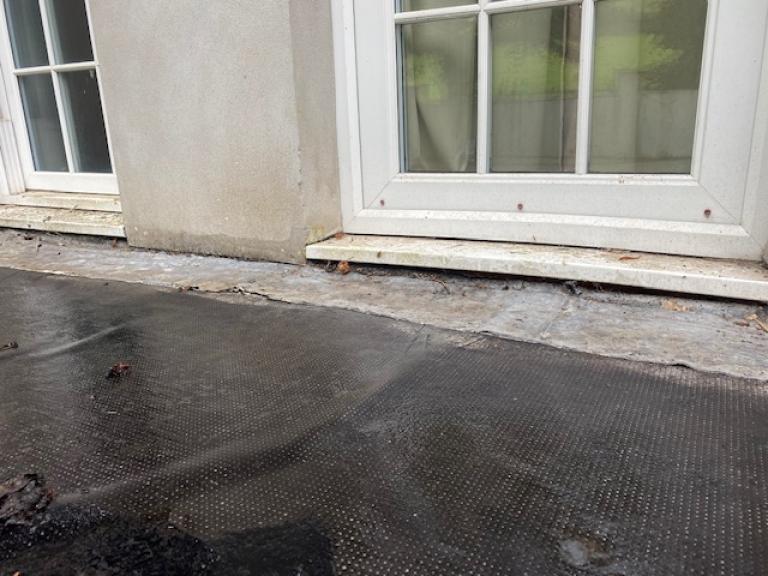 There was also perishing on a small flat area beneath the windows, resulting in lifting and cracking