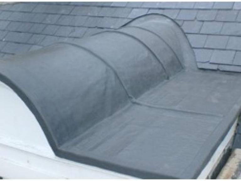 Listed building in Aberystwyth - the 'perfect forming', lead coloured liquid roofing system is ideal for this work