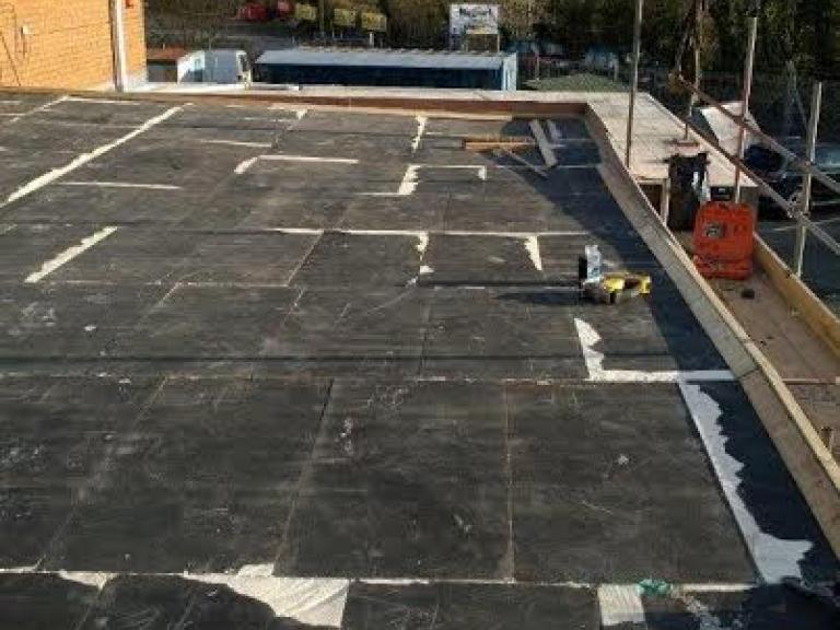 Creating a warm roof over the existing roof
