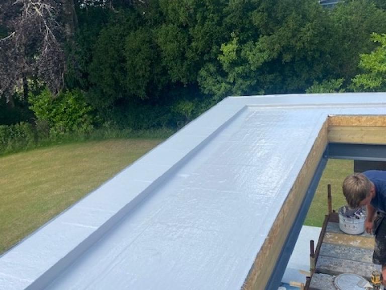 The adjoining end has steeper rise to collect the water (see side channel)