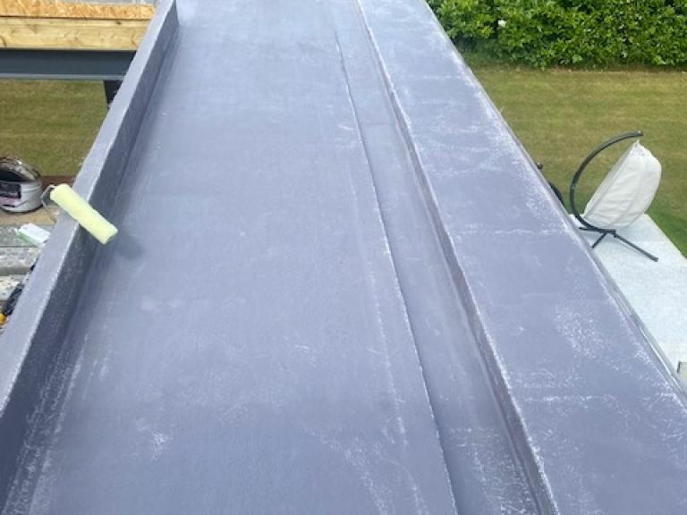 All water is held seamlessly and jointlessly away from the central skylight area