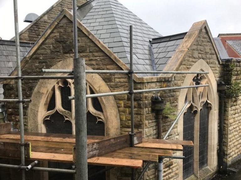 The lead work had been stripped along nearly every elevation