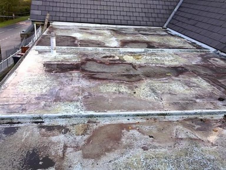 The GRP flat roof on this Primary School was in a terrible condition