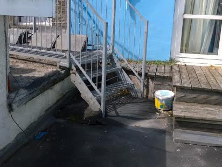 The roof was also affected by a fire escape walkway