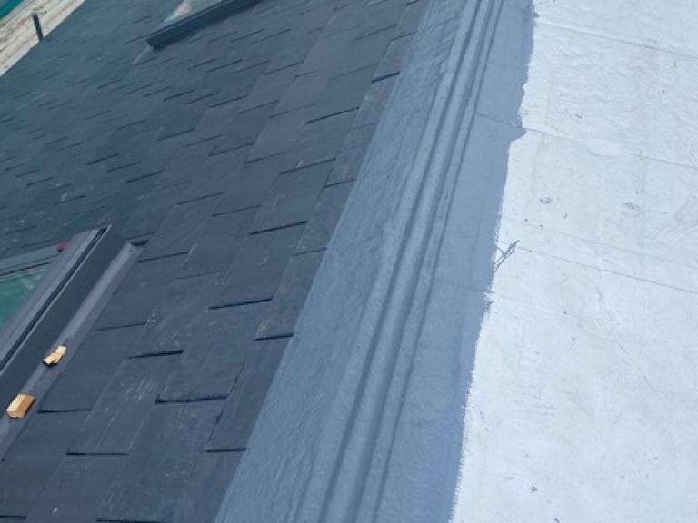 Covering the ridge to create a fully waterproof barrier protecting the pitched skylights below