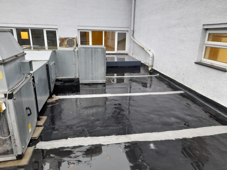 Existing seam areas were sealed to create a fully waterproof roof