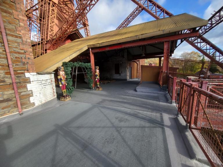 Notice the liquid roof terrace system extending up walls and upstands