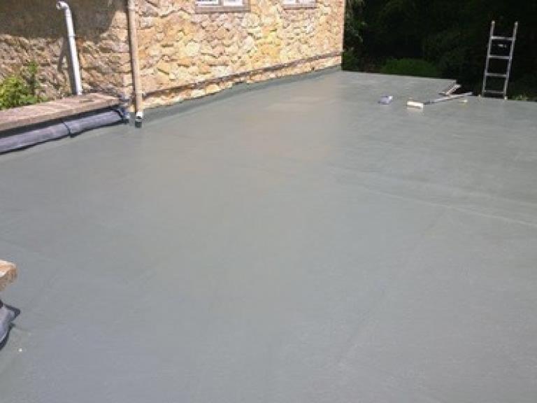 The roof was coated in a 15 yr polymer system