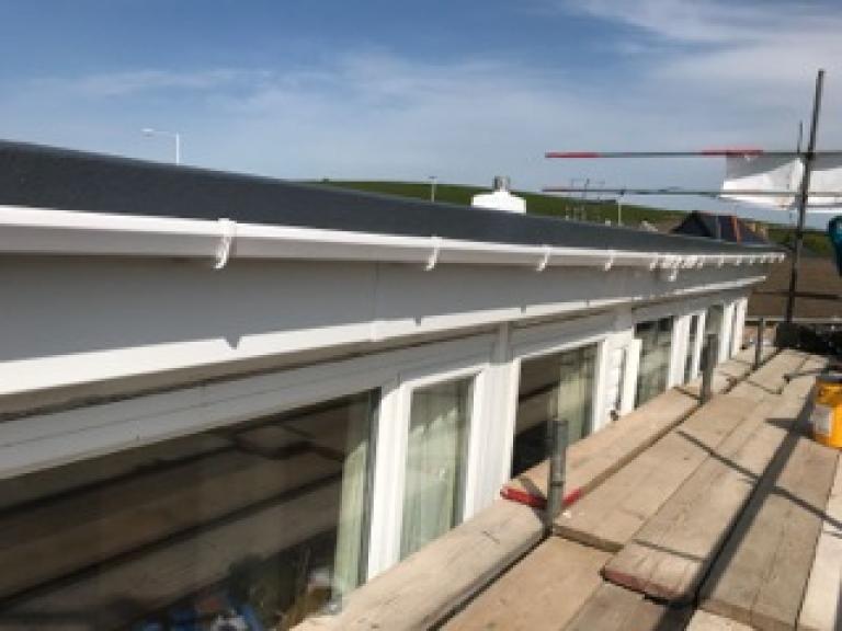 The roof is safe to walk on after 6 hours and guaranteed fully mechanically cured within 72 hours