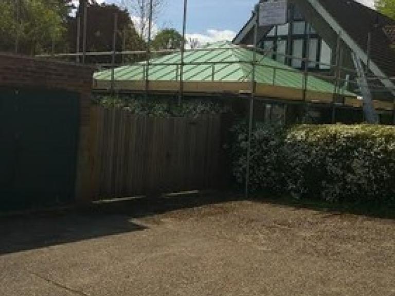 Liquid membrane and GRP matting encapsulation of the standing seams