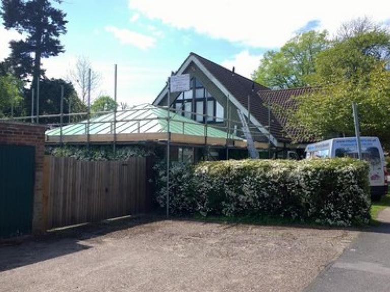 The hard edge metal trims are totally encapsulated to replicate copper roof drip edge