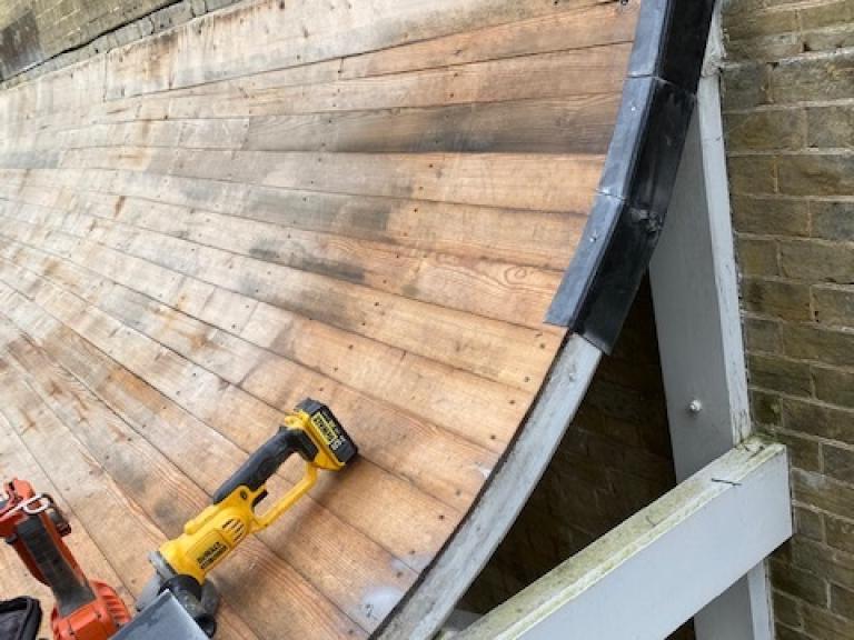 The area was thoroughly cleaned and sanded