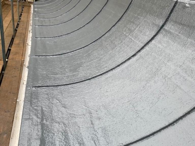 And finished with a topcoat of lead-look polymer roofing