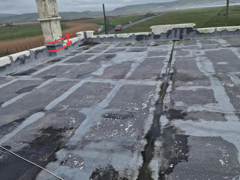 We applied 200mm smooth plaster above the insulation line all around the chimneys