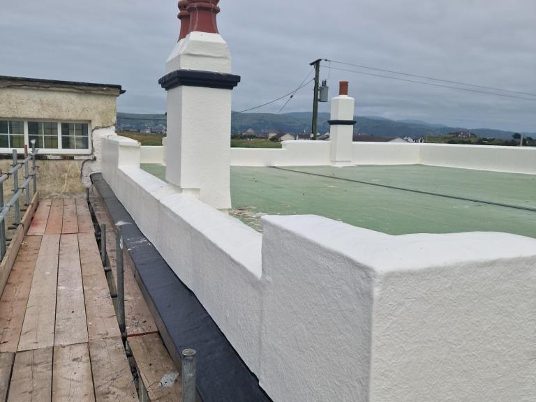 The Polyroof 25 year system extended over every surface and upstand