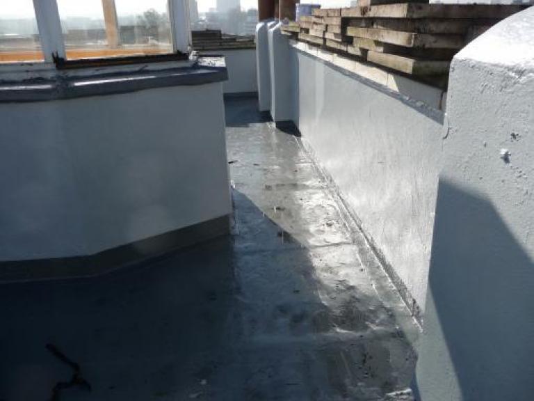 We removed the roof garden slabs and cleaned the substrate