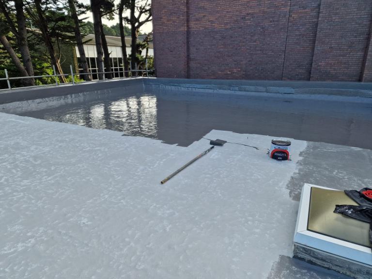 The final top coat mid-installation