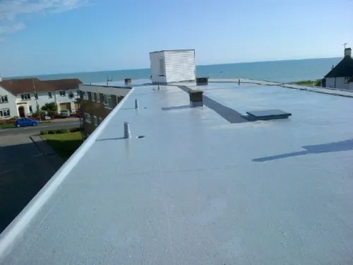 Completed flat roof of large apartment block in Bexhill, near Hastings in Sussex