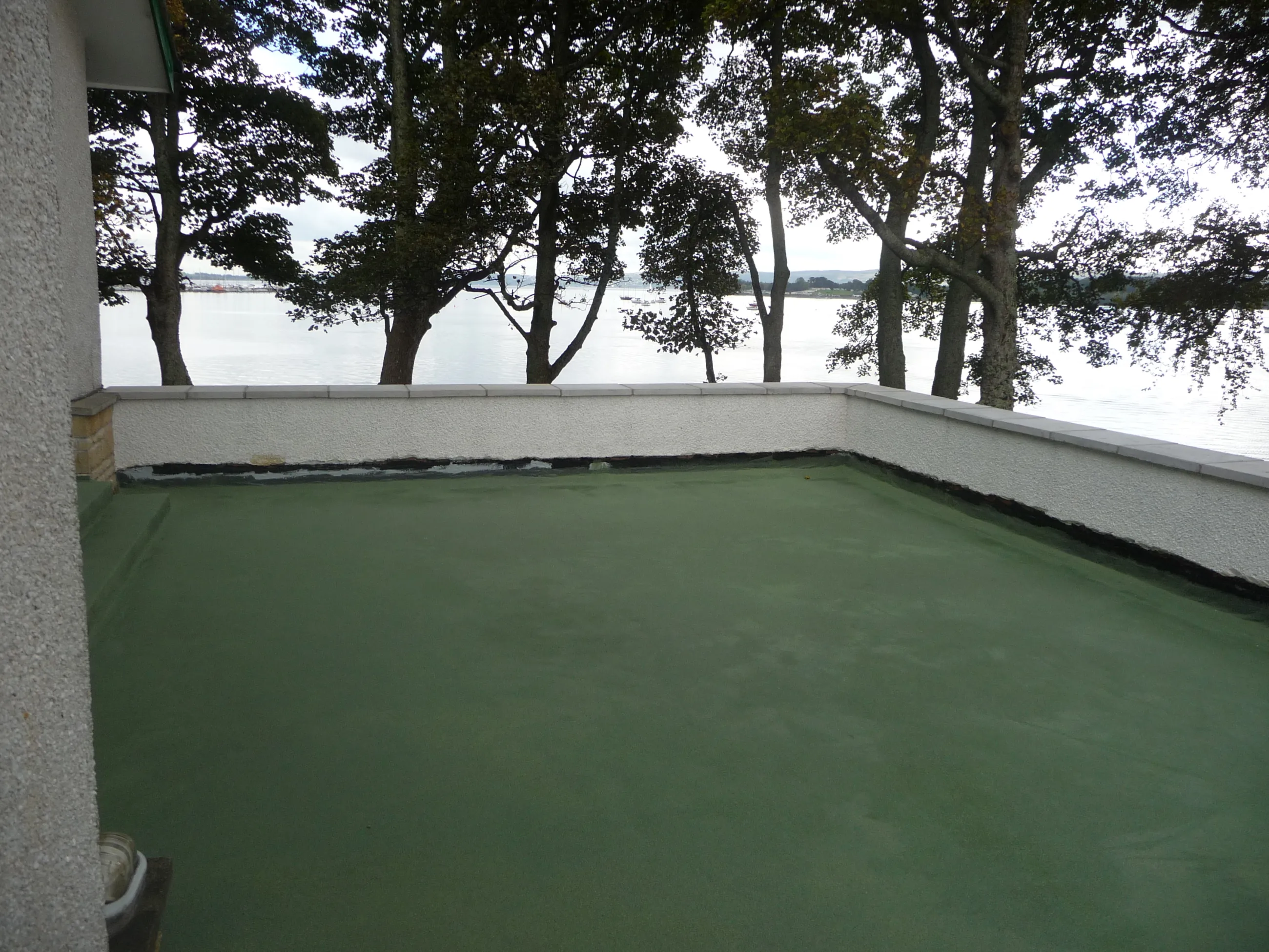 This balcony in Helensburgh, Scotland incorporates forest green quartz sealed in with specialist resin