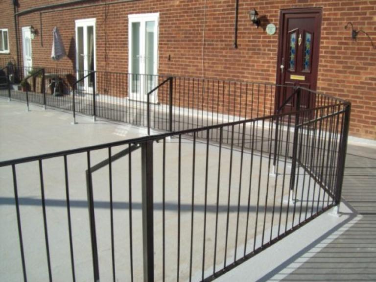 This balcony roof was entirely refurbished without disruption to the busy Tesco Express downstairs