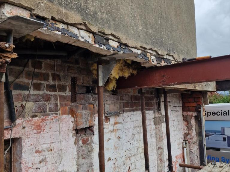 Thegarage was stripped right back to the adjoining wall