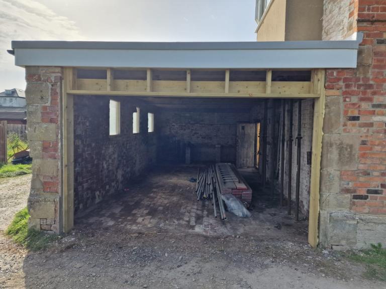 And a made-to-size opening for the garage door