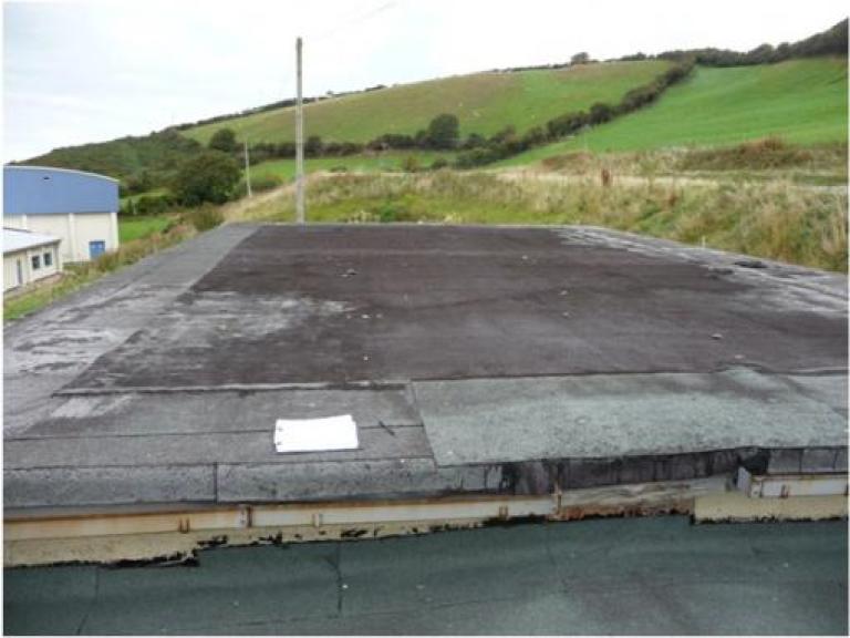 Aberaeron school computer room roof - a leaking patchwork of old repairs