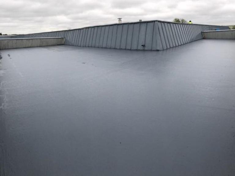 This large area was easily covered using the polymer roofing system