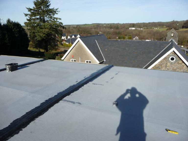 Work in progress - The canteen roof was pressure washed clean