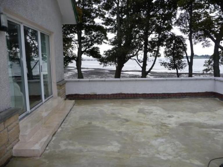 Balcony in Helensburgh in Scotland with concrete decking and primer applied